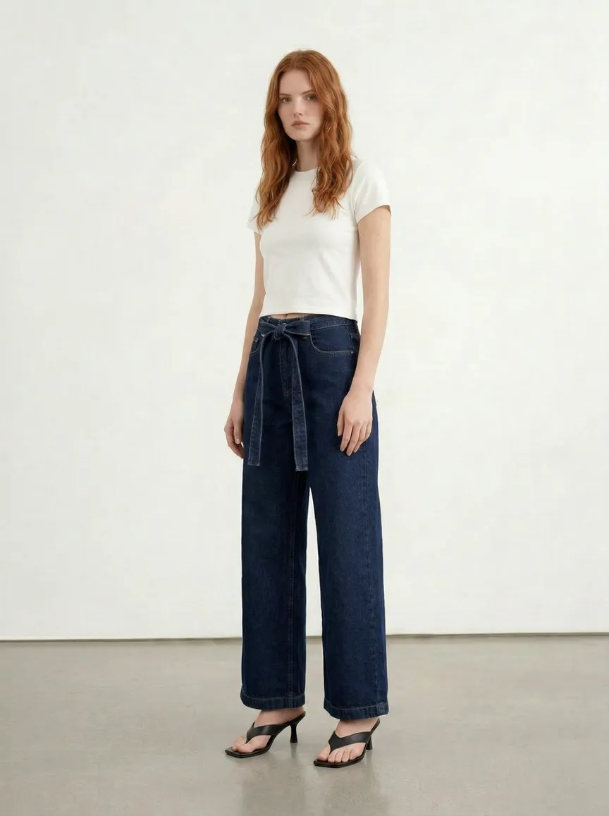 MODA AI on-model fashion catalog — set 1, alternate angle 1: same model, same look, AI-generated studio-quality shot