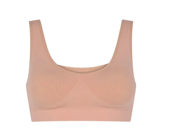 Input flat lay — blush nude seamless bralette on white background, used as garment source for MODA AI generation