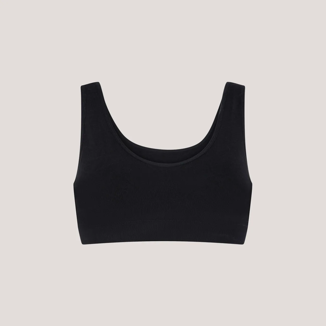 Input flat lay — black seamless scoop-neck bralette front view on neutral background, used as MODA AI source image