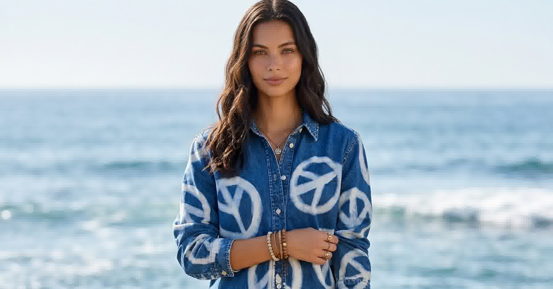 AI-generated model in denim peace-sign set on coastal rocks under noon summer sun